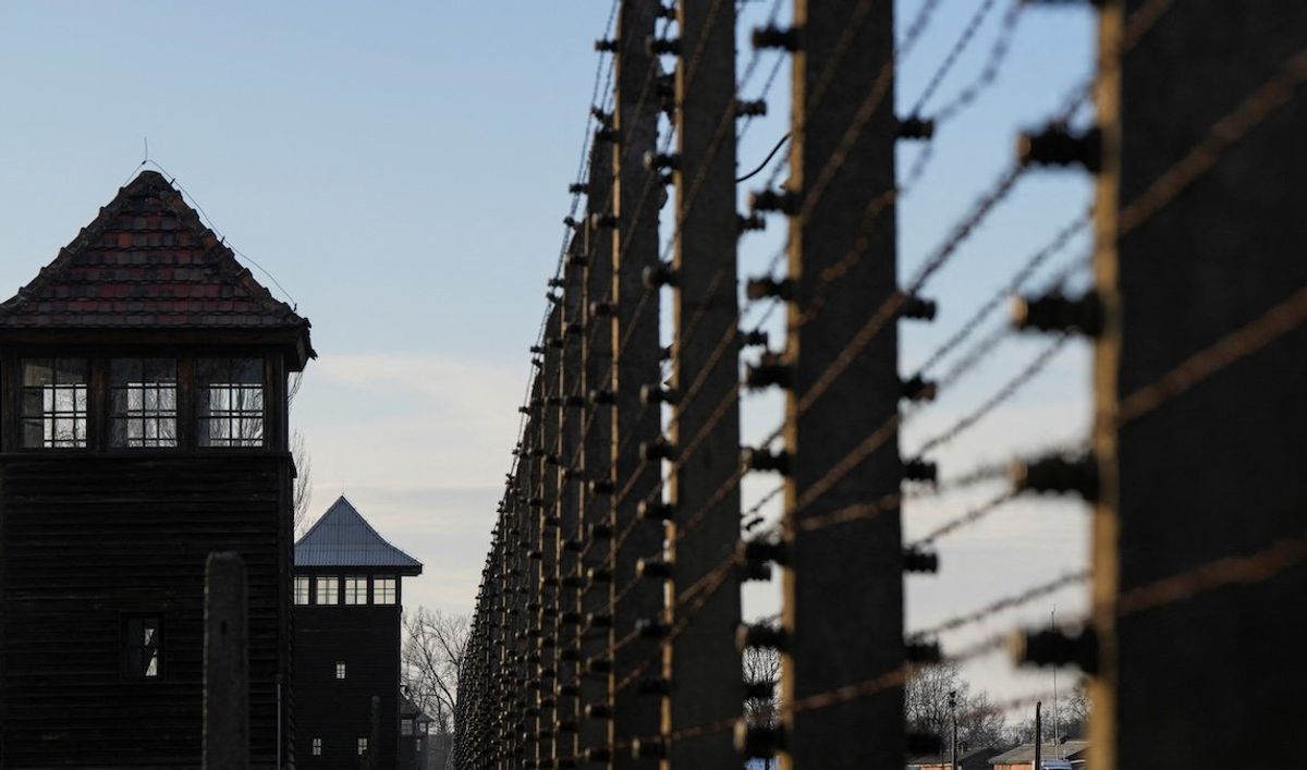 ​A barbed-wire fence is seen at the site of the former Nazi German concentration and extermination camp Auschwitz-Birkenau prior to the 80th anniversary of the liberation of the camp in Brzezinka, Poland.