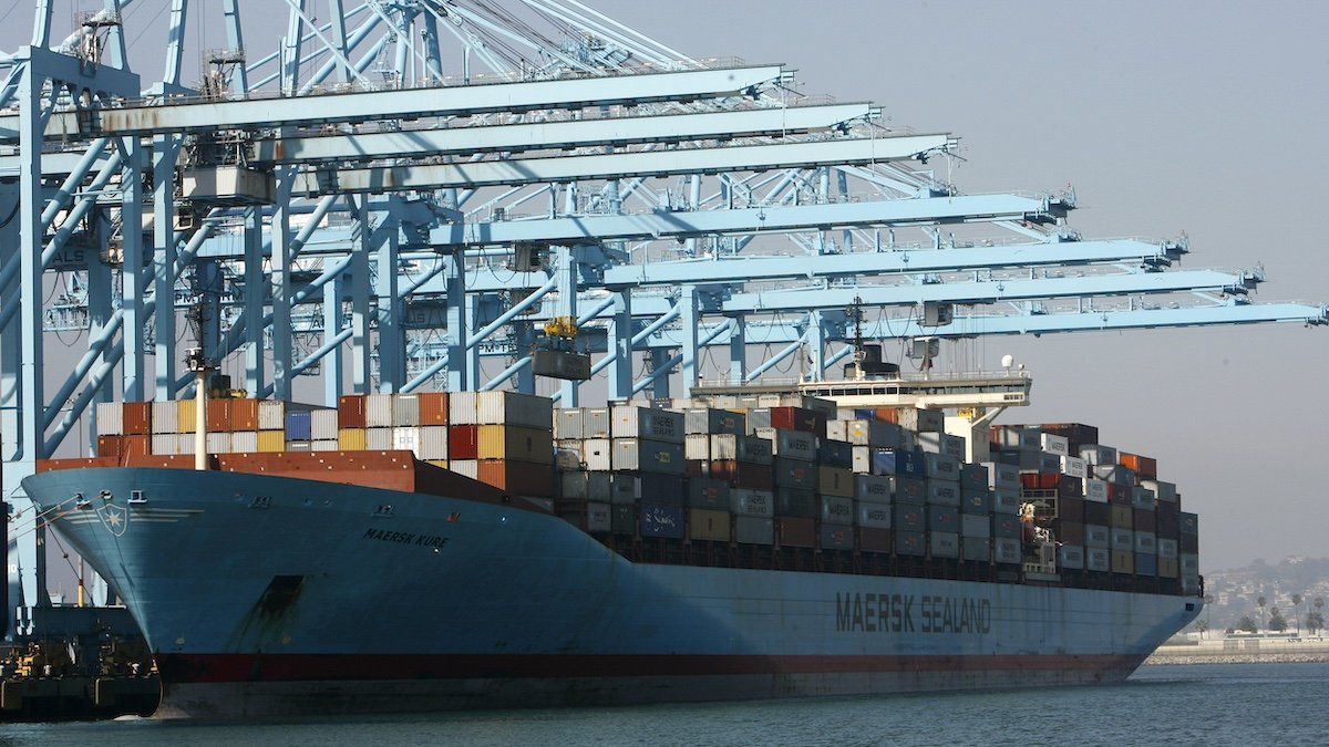 A container ship is docked at the port of Los Angeles on July 2 , 2008. 