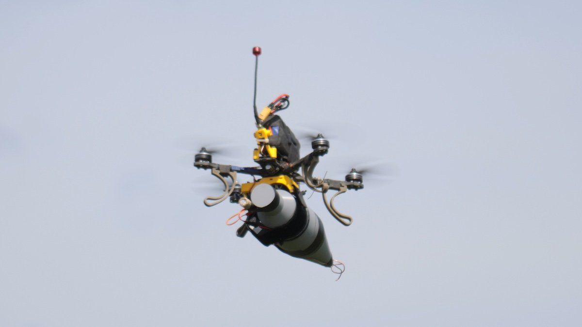 A kamikaze drone with a warhead is performing a demonstration flight during the 2nd Drone Racing Tournament by the Federation of Military Technological Sports of Ukraine in Bilohorodka, Kyiv region, north-central Ukraine, on July 21, 2024. 