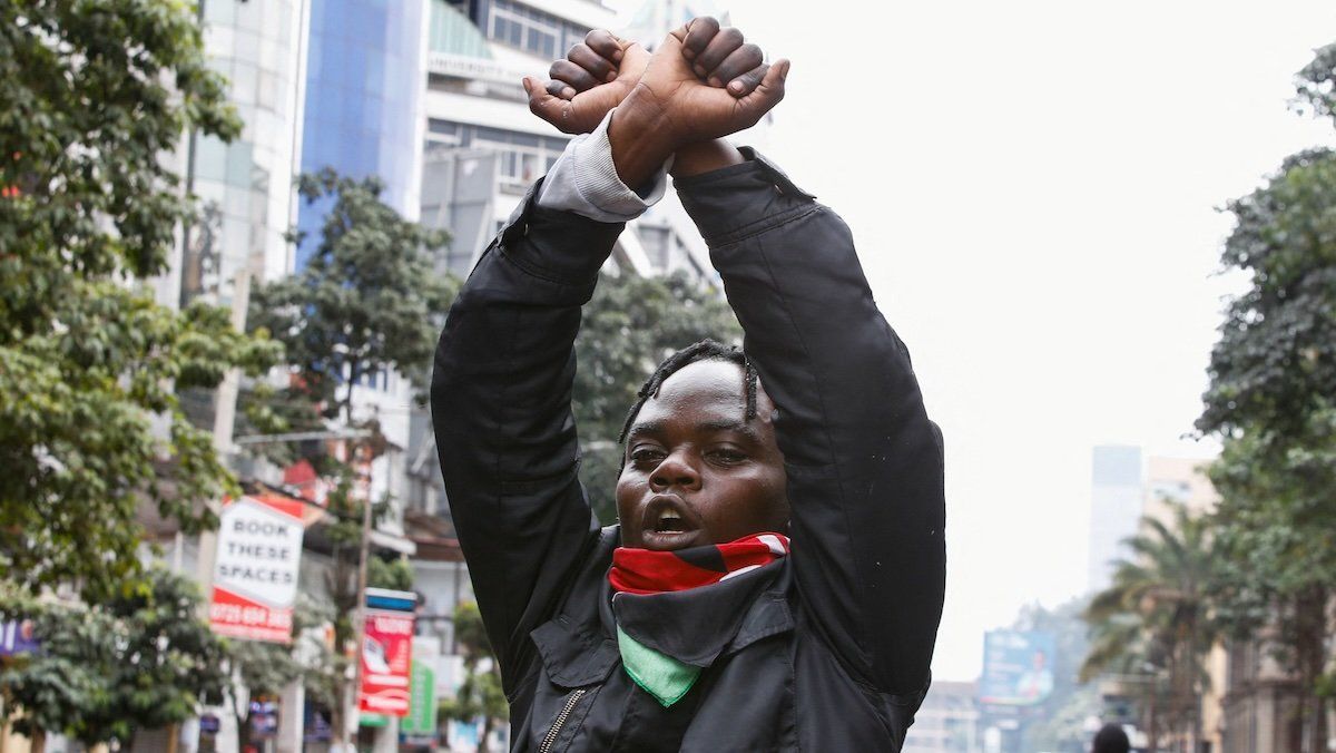 A man gestures at a demonstration over police killings of people protesting against Kenya's proposed finance bill 2024/2025, in Nairobi, Kenya, June 27, 2024.