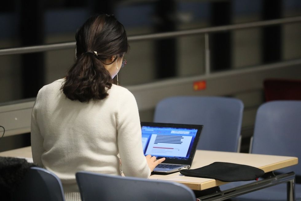 ​A photo of a student using a chatbot.