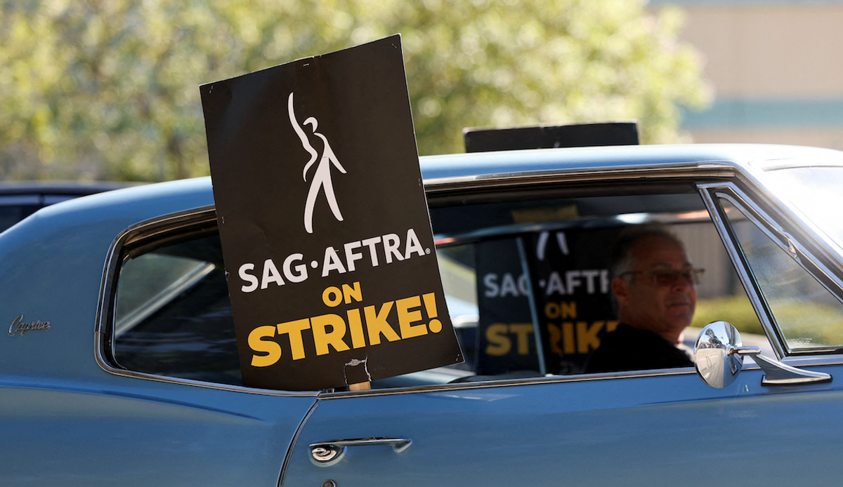 A SAG-AFTRA placard is placed inside a car in Burbank, California, during an earlier strike in 2023.  