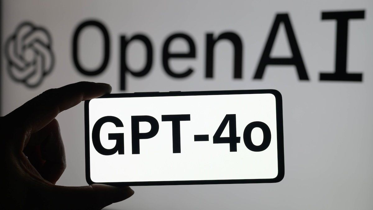 A smartphone is displaying GPT-4o with the OpenAI logo visible in the background in this photo illustration, taken in Brussels, Belgium, on May 13, 2024. 