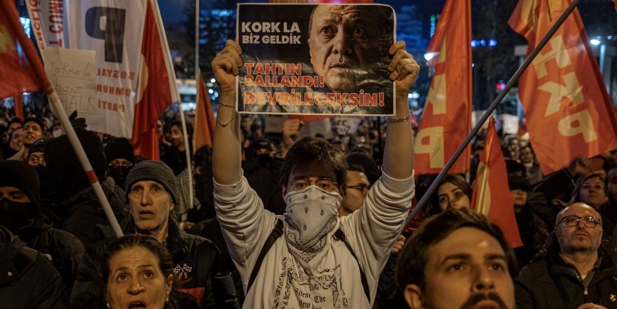 ​A young protester is holding a banner with a photo of Turkey's President Recep Tayyip Erdogan during the demonstration. Protests in Ankara continue into their fifth day following the arrest of Istanbul Metropolitan Municipality Mayor, Ekrem Imamoglu.