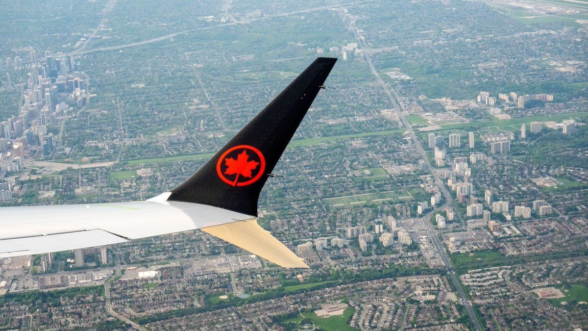 ​An Air Canada plane is seen in the air after departing from Pearson International Airport in Toronto, Ontario, Canada May 16, 2022. 