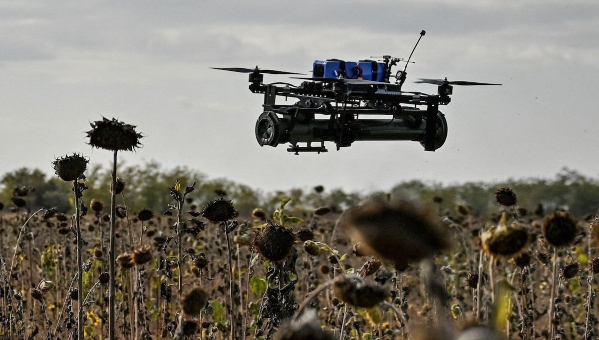 An FPV drone with an attached portable grenade launcher is seen during a test flight conducted by Ukrainian servicemen of the 'Bulava' Unmanned Aerial Vehicles Unit of the Separate Presidential Brigade at their position near a frontline, amid Russia's attack on Ukraine, in Zaporizhzhia region, Ukraine, on Oct. 11, 2024. 