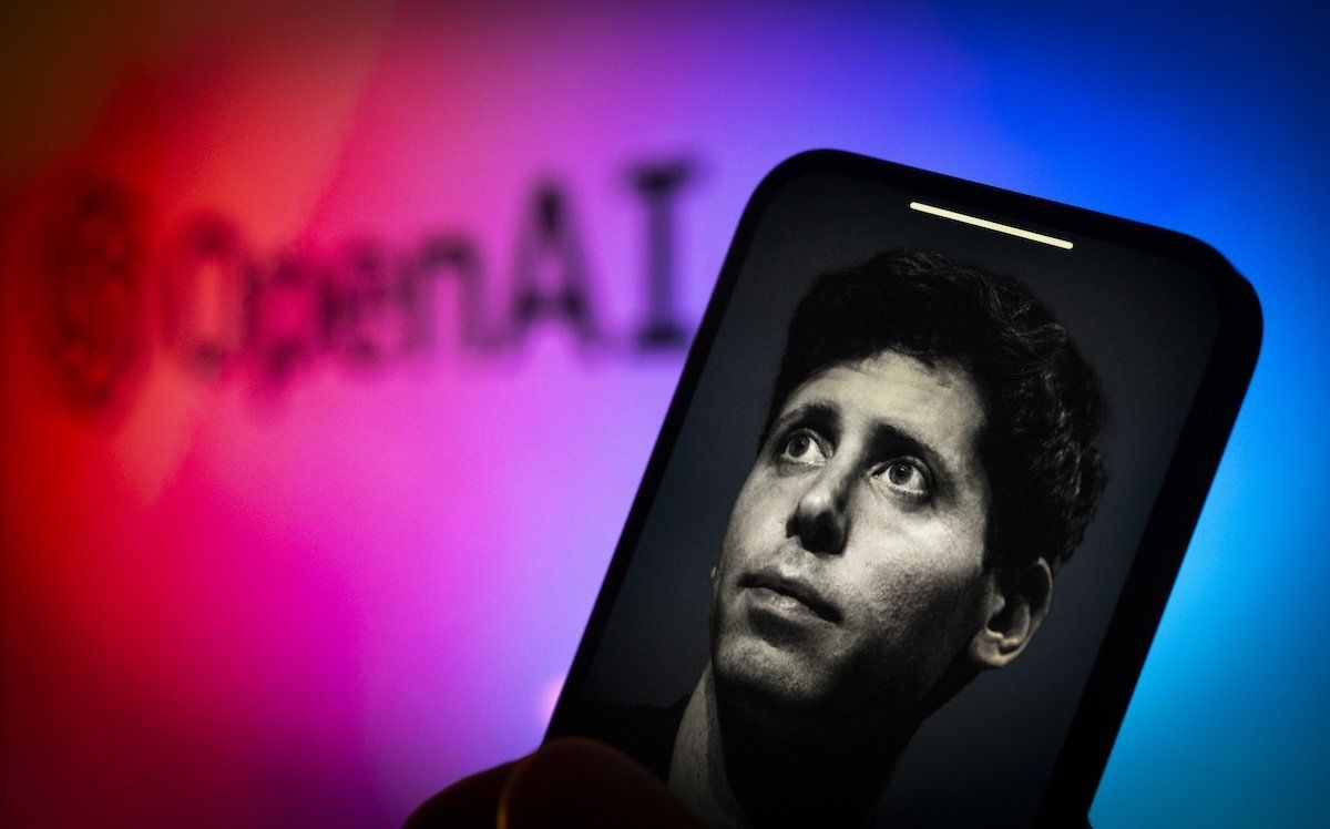 ​An image of OpenAI CEO Sam Altman is seen on a mobile device screen in this illustration.