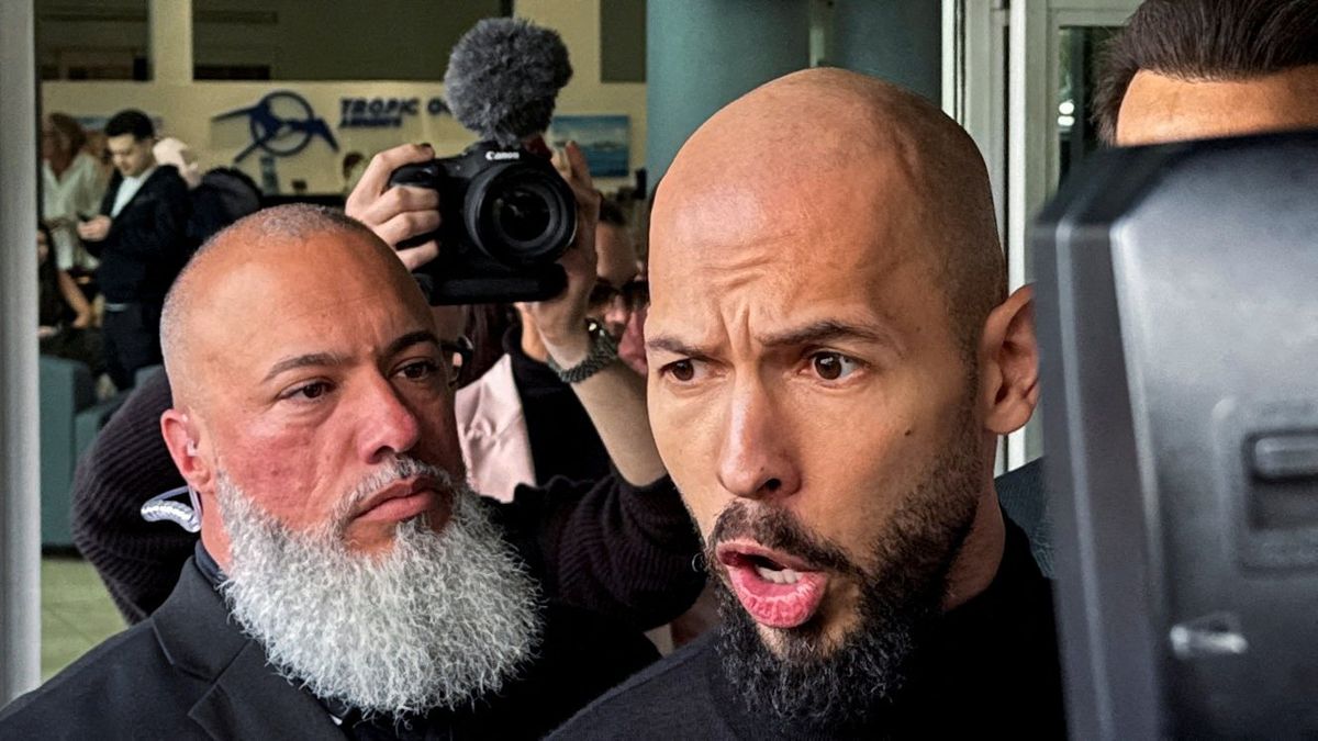 ​Andrew Tate speaks to the media upon arrival from Romania, after prosecutors lifted a travel ban related to criminal charges against him and his brother Tristan, in Fort Lauderdale, Florida, U.S. February 27, 2025. 