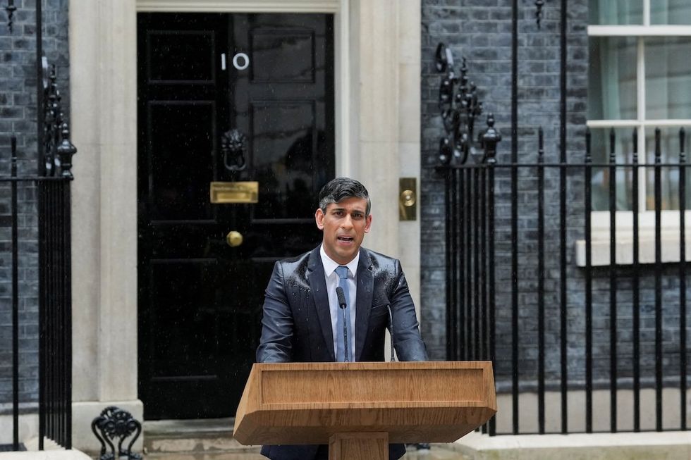 ​British Prime Minister Rishi Sunak delivers a speech calling for a general election outside No. 10 Downing Street, in London, Britain, on May 22, 2024. 