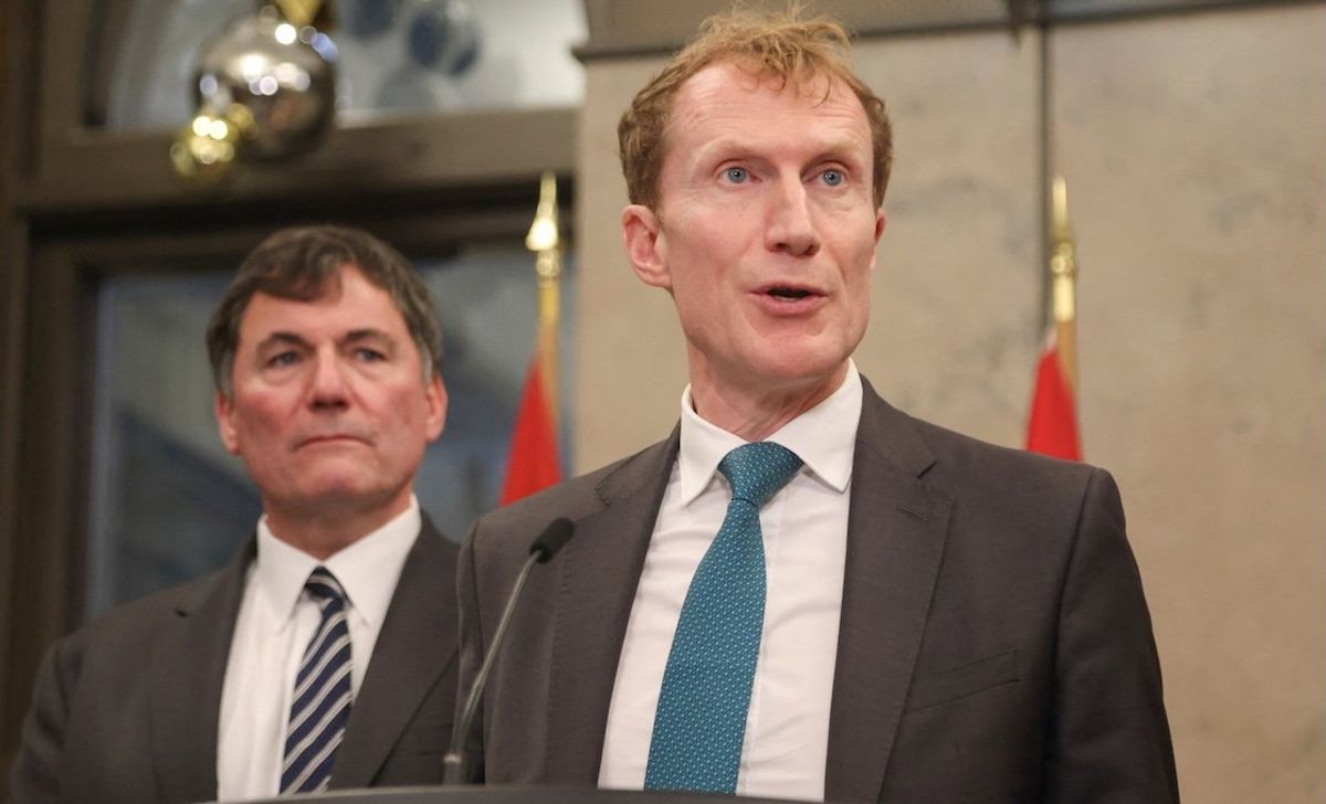 ​Canada's Minister of Immigration, Refugees and Citizenship Marc Miller speaks at a press conference about the government's border plan as Public Safety and Finance Minister Dominic LeBlanc listens, on Parliament Hill in Ottawa, Ontario, on Dec. 17, 2024. 