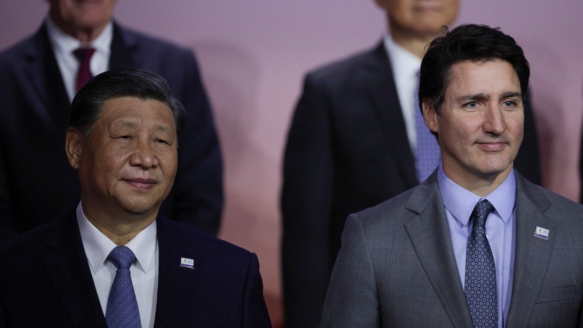 Chinese President Xi Jinping and Canada's Prime Minister Justin Trudeau pose for a family photo during Asia-Pacific Economic Cooperation (APEC) CEO Summit in San Francisco, California, U.S. November 16, 2023.