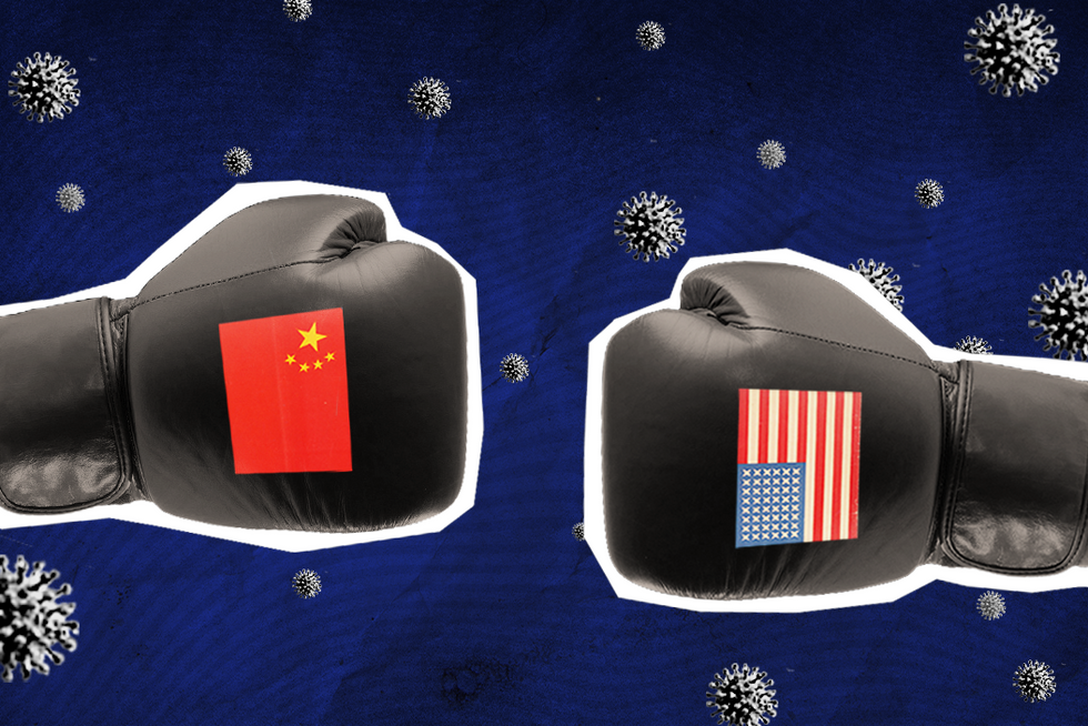 cut-outs of boxing gloves, with China and US flags on them.