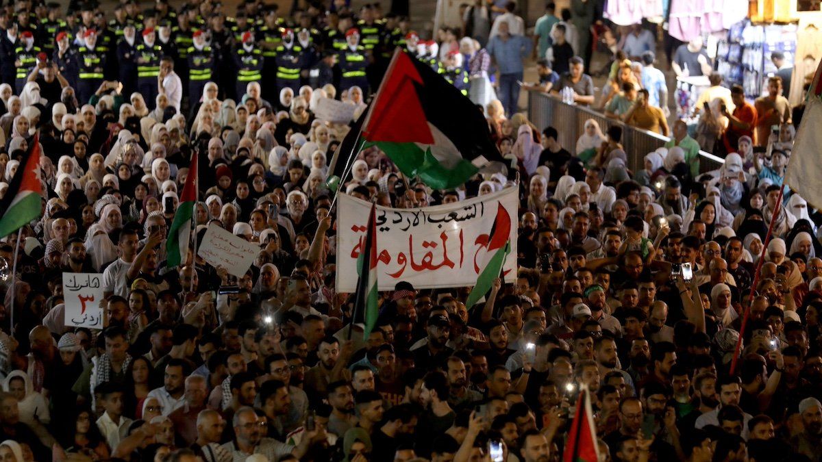 ​Demonstrators take part in a march in support of Palestinians in Gaza and to salute the slain Jordanian who shot and killed three Israeli civilians, according to the Israeli authorities, at the Allenby Bridge border crossing in the occupied West Bank, in Amman, Jordan September 8, 2024. 