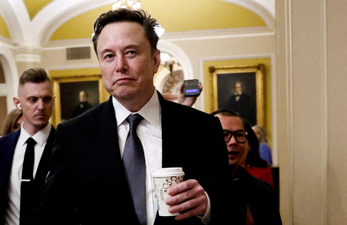 ​Elon Musk walks on Capitol Hill on the day of a meeting with Senate Republican Leader-elect John Thune (R-SD), in Washington, U.S. December 5, 2024. 