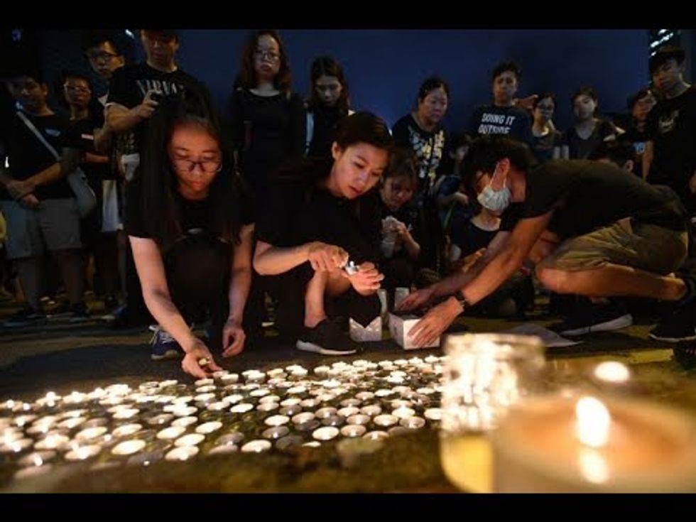 Hong Kong braces for strikes following record protest turnout