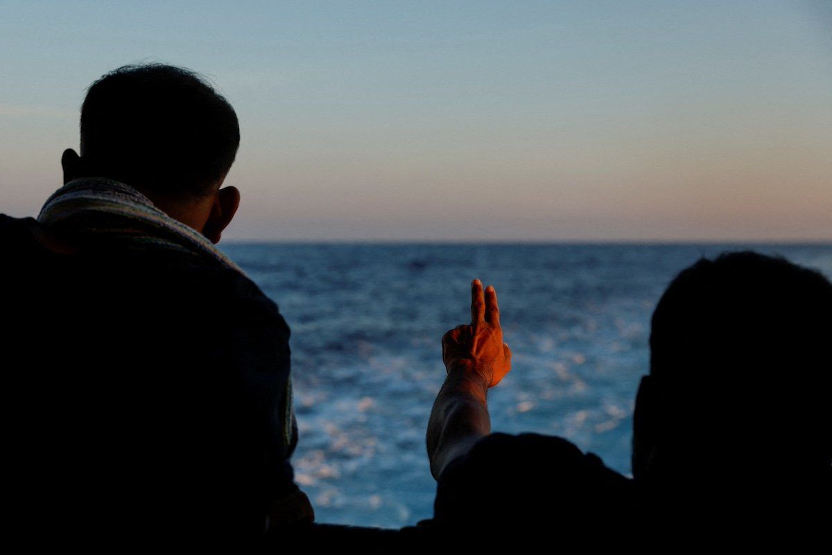FILE PHOTO: A migrant gestures on the Geo Barents migrant rescue ship, operated by Medecins Sans Frontieres (Doctors Without Borders), September 30, 2023.