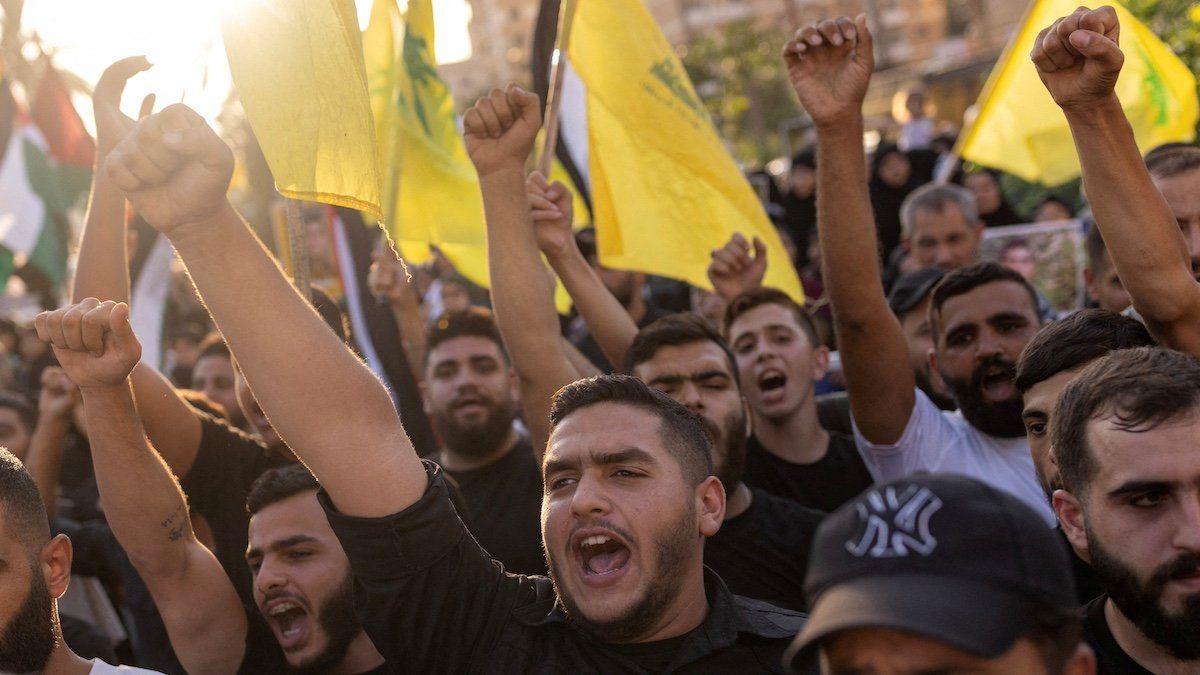 ​FILE PHOTO: Supporters of Hamas and Hezbollah shout slogans during a protest condemning the killing of Hamas leader Ismail Haniyeh and Hezbollah top commander Fuad Shukr, in Sidon, Lebanon, August 2, 2024. 