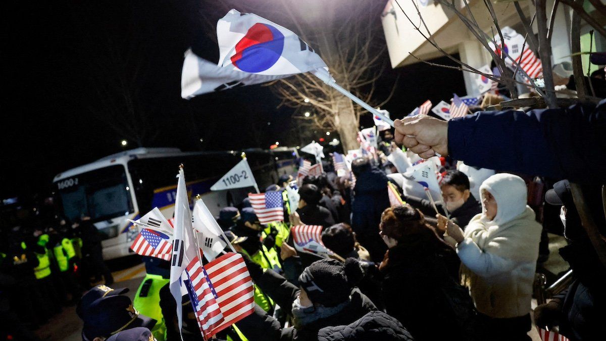 FILE PHOTO: Supporters of impeached South Korea's President Yoon Suk Yeol participate in a rally outside the Seoul Detention Center in Uiwang, South Korea, January 18, 2025. 