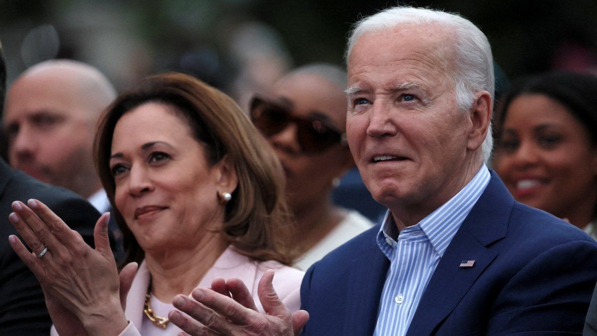 ​FILE PHOTO: U.S. President Joe Biden claps hands next to U.S. Vice-President Kamala Harris while hosting a Juneteenth concert on the South Lawn at the White House in Washington, D.C., U.S. June 10, 2024. 