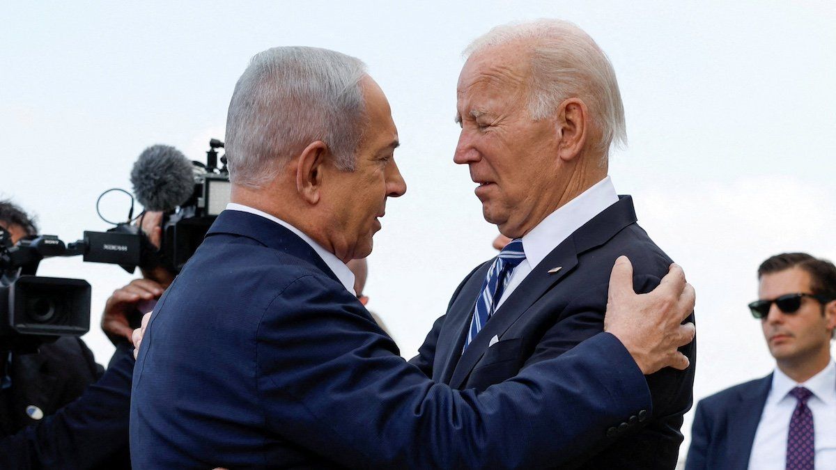 ​FILE PHOTO: U.S. President Joe Biden is welcomed by Israeli Prime Minster Benjamin Netanyahu, as he visits Israel amid the ongoing conflict between Israel and Hamas, in Tel Aviv, Israel, October 18, 2023. 