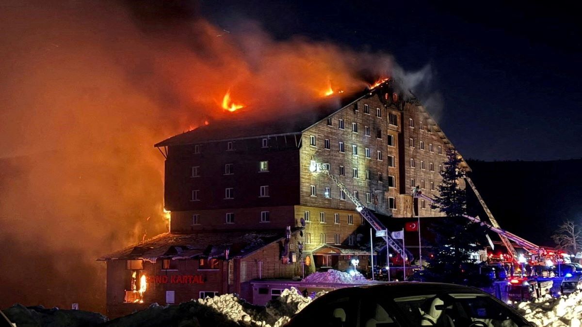 Firefighters work to extinguish a fire at a hotel in the ski resort of Kartalkaya in Bolu province, Turkey, January 21, 2025.