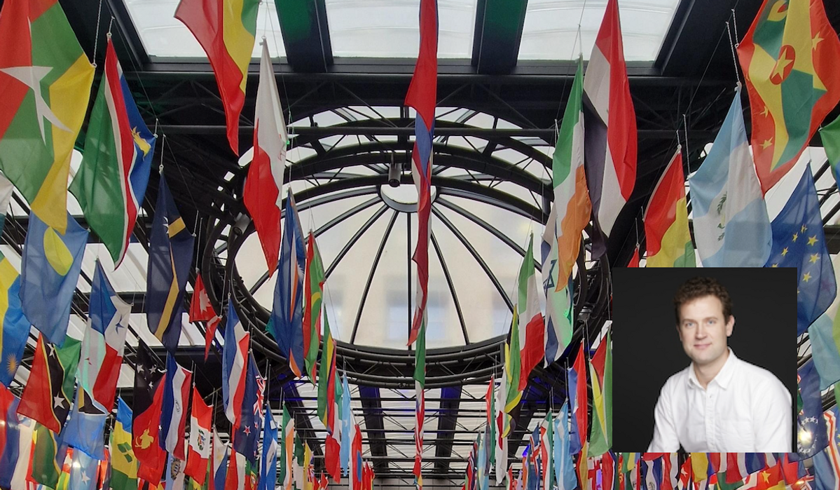 ​Flags hung at the reconvening of the COP16 conference in Rome last month, with an inset image of Adrian Gahan, the ocean lead for Campaign for Nature.