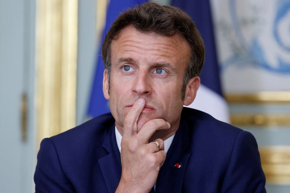 French President Emmanuel Macron takes part in an expanded videoconference in Paris, France, April 19, 2022. 