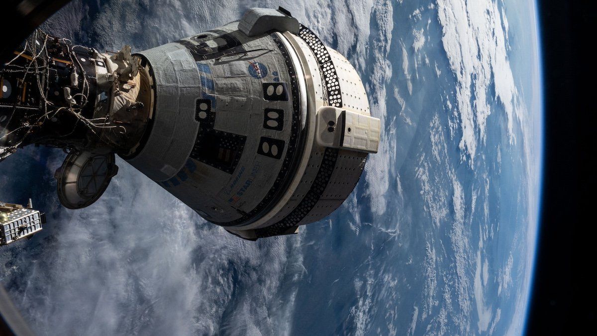 Handout file photo dated July 3, 2024 shows Boeing's Starliner spacecraft that launched NASA's Crew Flight Test astronauts Butch Wilmore and Suni Williams to the International Space Station is pictured docked to the Harmony module's forward port.