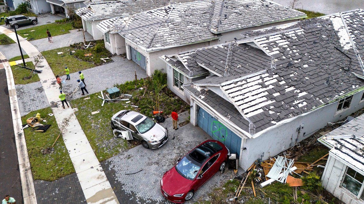 Homes and cars were damaged in the Avenir development by a tornado from Hurricane Milton on October 10, 2024, in Palm Beach Gardens, Florida.