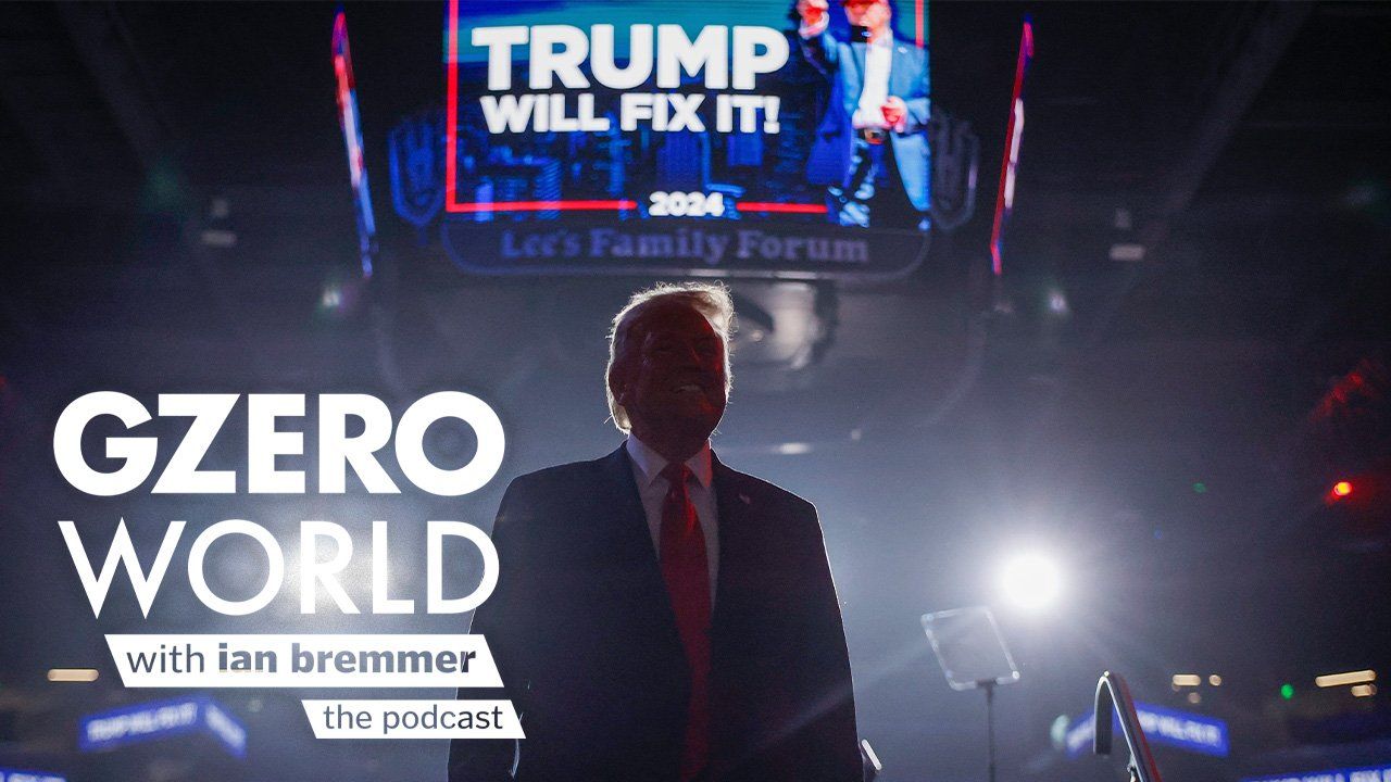 US President-elect Donald Trump stands on a stage, depicted in silhouette, in front of a large screen displaying the words "Trump will fix it!", with text art reading 'GZERO World with Ian Bremmer – the podcast'