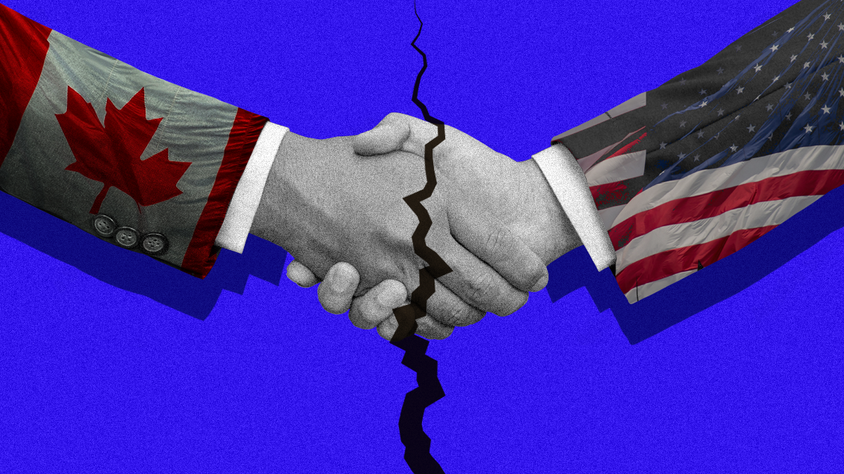 A handshake, where one arm has a Canadian flag on its sleeve and the other the US, but there is a crack in the center of the handshake