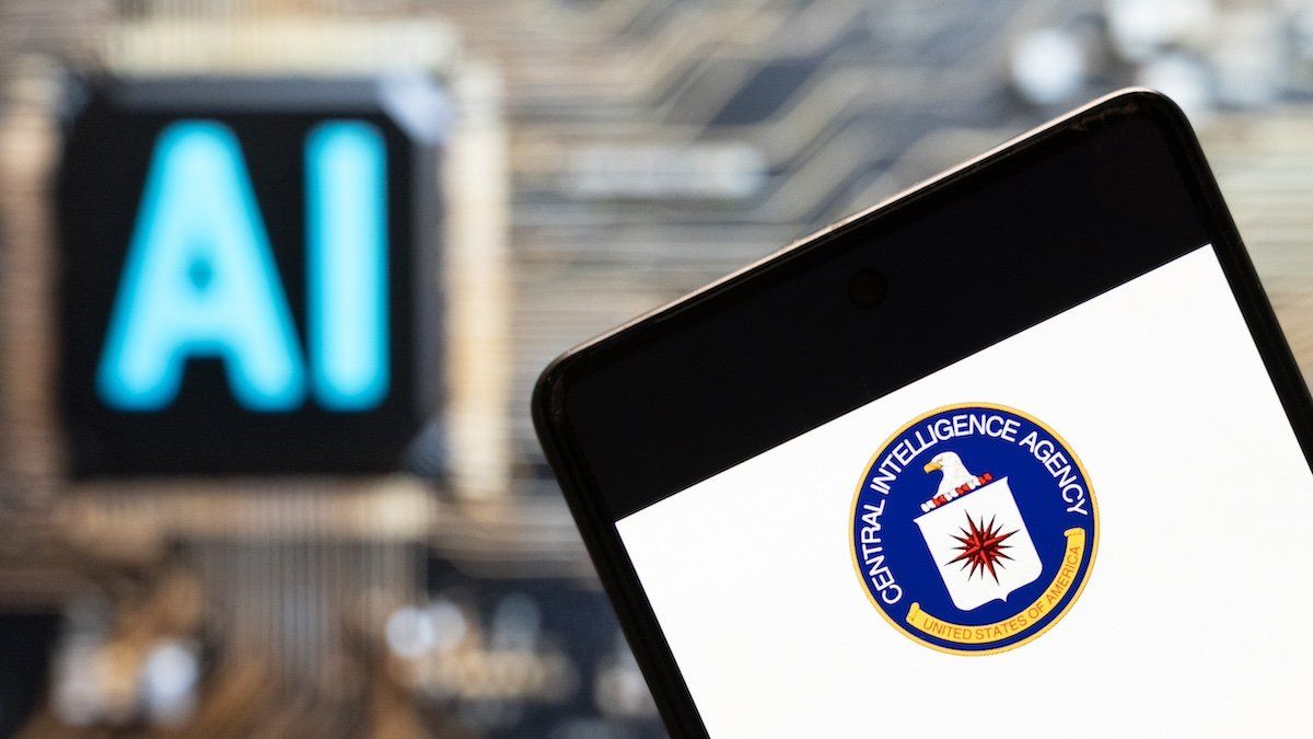 ​In this photo illustration, the American Central Intelligence Agency (CIA) logo seen displayed on a smartphone with an Artificial intelligence (AI) chip and symbol in the background. 