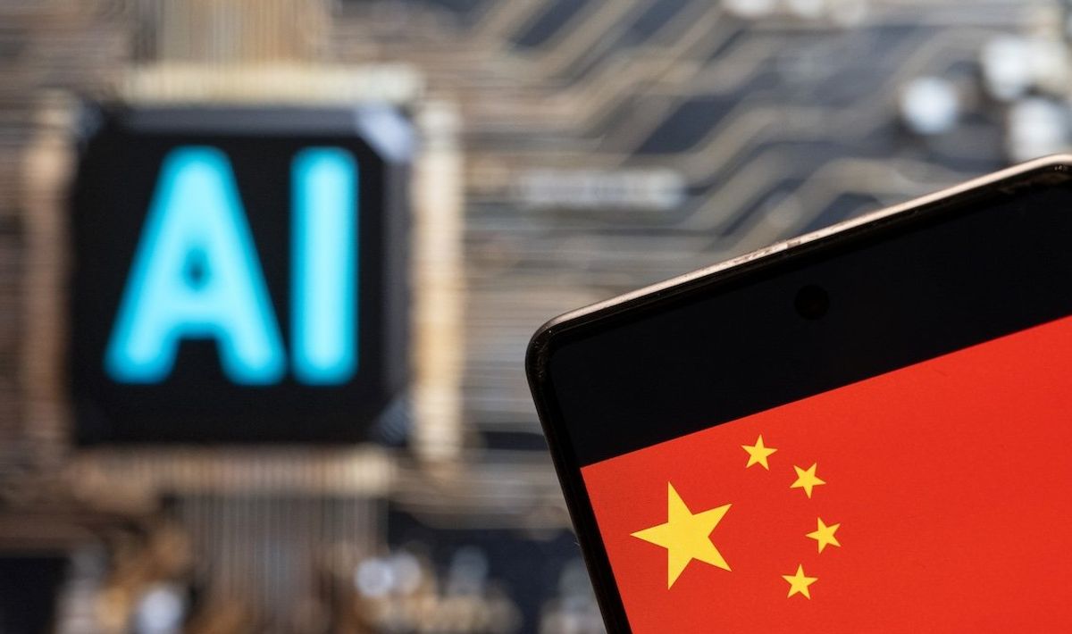 ​In this photo illustration, the People's Republic of China flag is displayed on a smartphone with an Artificial intelligence chip and symbol in the background. 