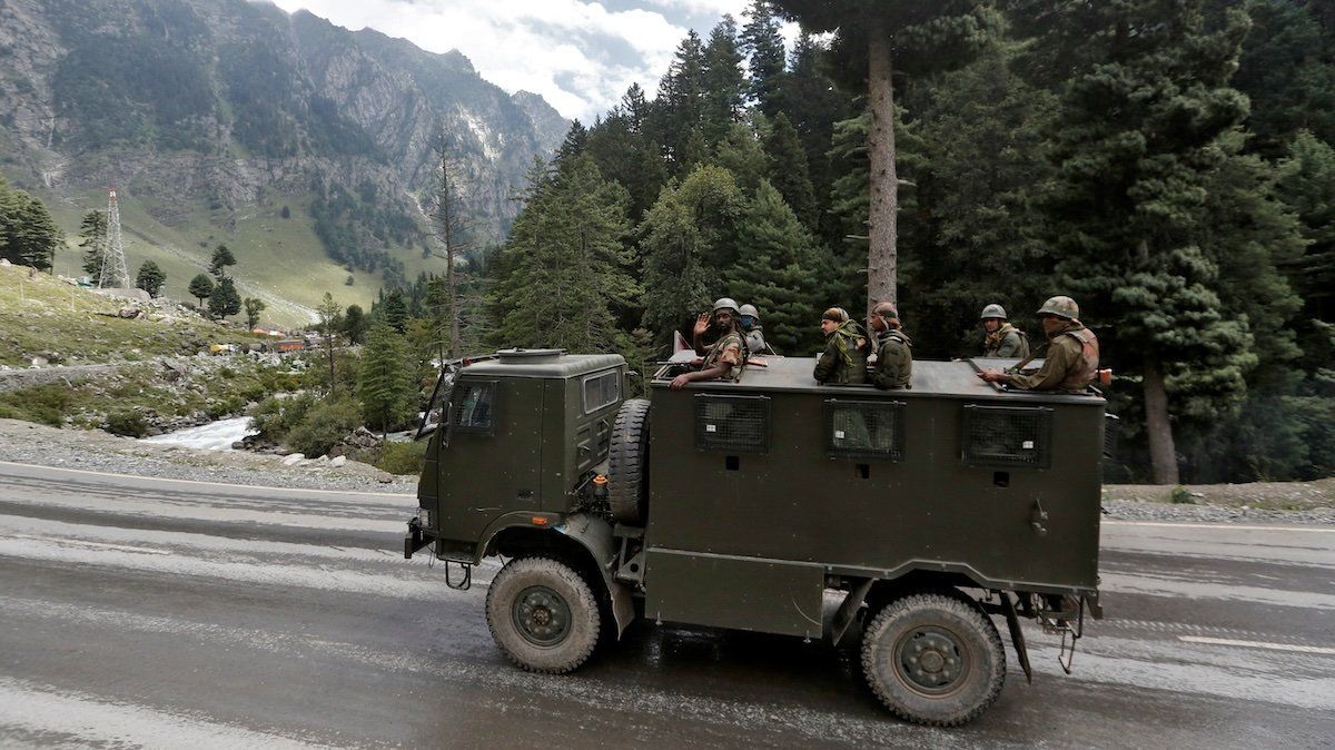 Indian army soldiers are seen atop a vehicle on a highway leading to Ladakh, at Gagangeer in Kashmir's Ganderbal district September 2, 2020.