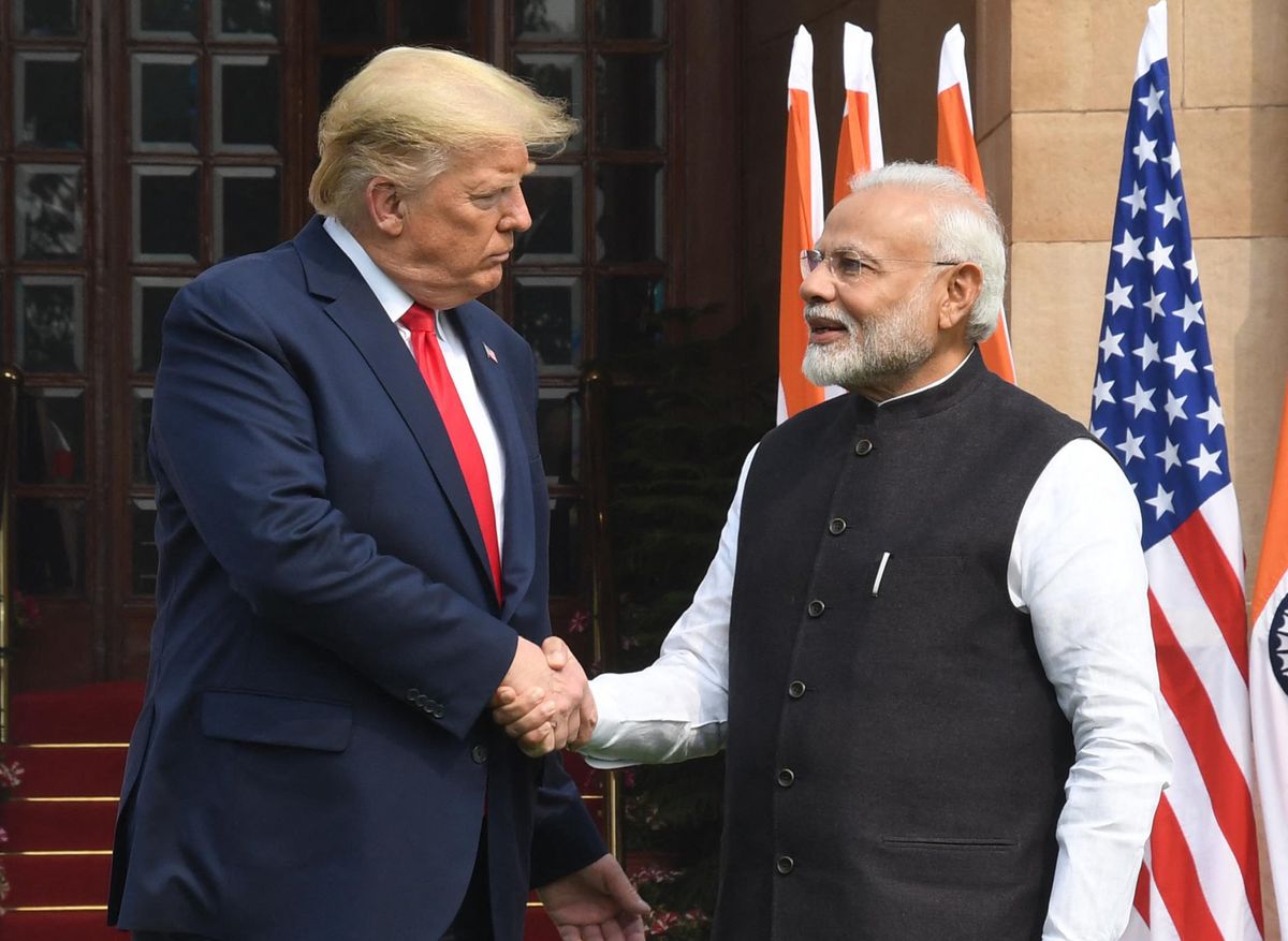 ​Indian Prime Minister Narendra Modi and then-US President Donald Trump shake hands before a meeting at Hyderabad House in Delhi, India, on Feb. 25, 2020. 