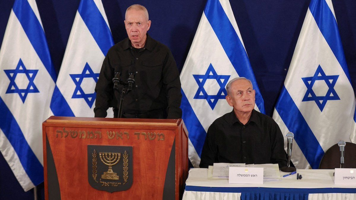 ​Israeli defense minister Yoav Gallant speaks next to prime minister Benjamin Netanyahu during a press conference in the Kirya military base in Tel Aviv , Israel , 28 October 2023. 