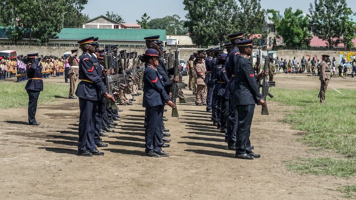 Kenyan police officers wearing ceremonial uniform participate in a parade during the commemoration of 61st Madaraka Day. A contingent of Kenyan Police is awaiting deployment to lead a Multinational Security Support Mission(MSS) to Haiti.
