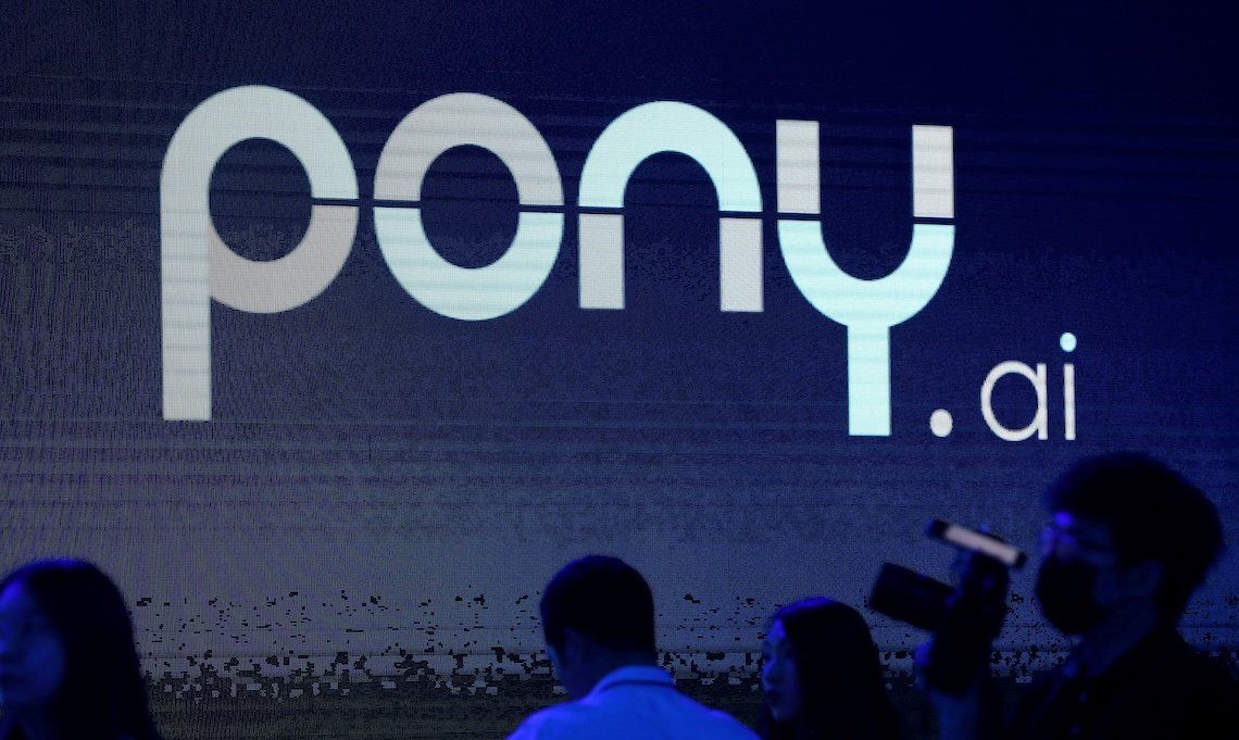 A logo of the autonomous driving technology startup Pony.ai is seen on a screen during an event in Beijing, China, in 2021.