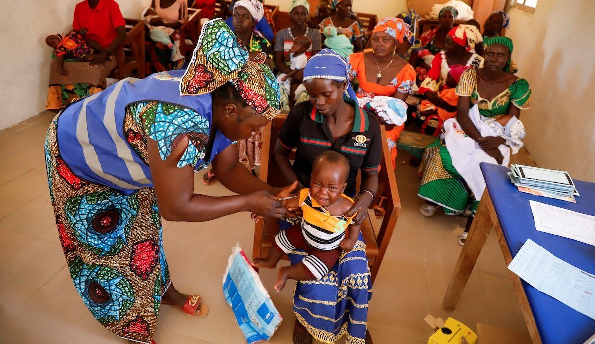 A nurse administers a malaria vaccine to an infant at the health center in Datcheka, Cameroon January 22, 2024.