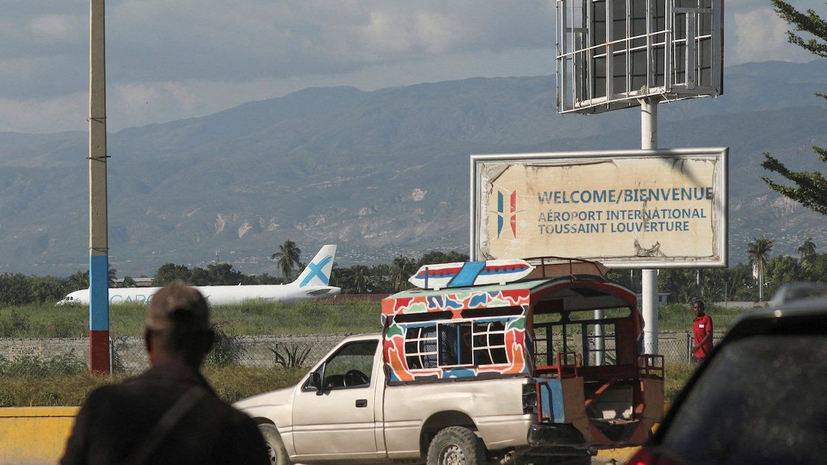 A person walks outside Toussaint Louverture International Airport after airlines suspended flights, in Port-au-Prince, Haiti October 25, 2024. 