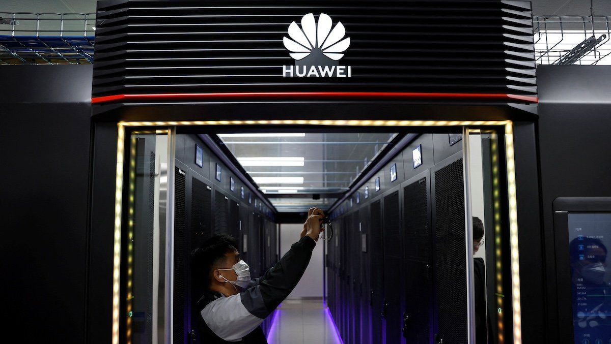 ​A reporter films at a data centre supported by Huawei, at Hongliulin Coal Mine during a Huawei-organised media tour, in Shenmu of Yulin city, Shaanxi province, China April 25, 2023. 