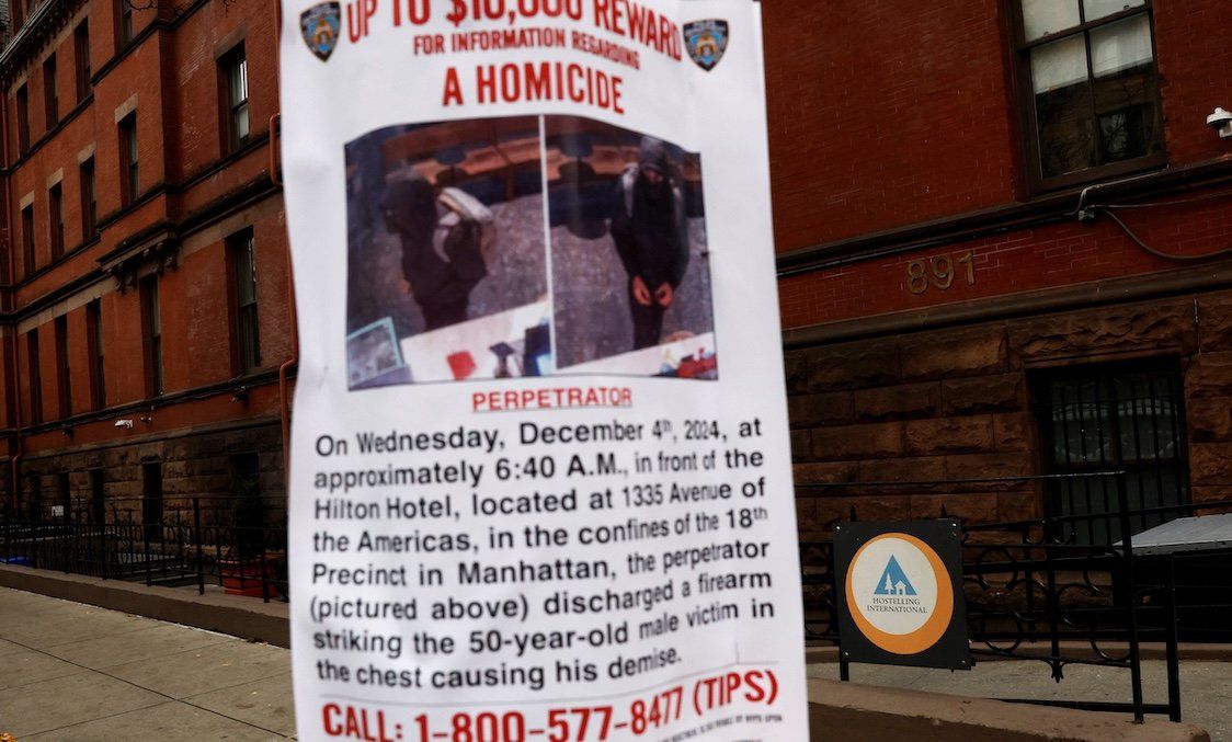 ​A reward poster for information leading to the arrest of the suspect is seen on the Upper West Side, Manhattan. 