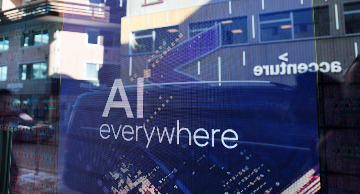 ​A slogan related to Artificial Intelligence is displayed on a screen in the Intel pavilion during the 54th annual meeting of the World Economic Forum in Davos, Switzerland. 