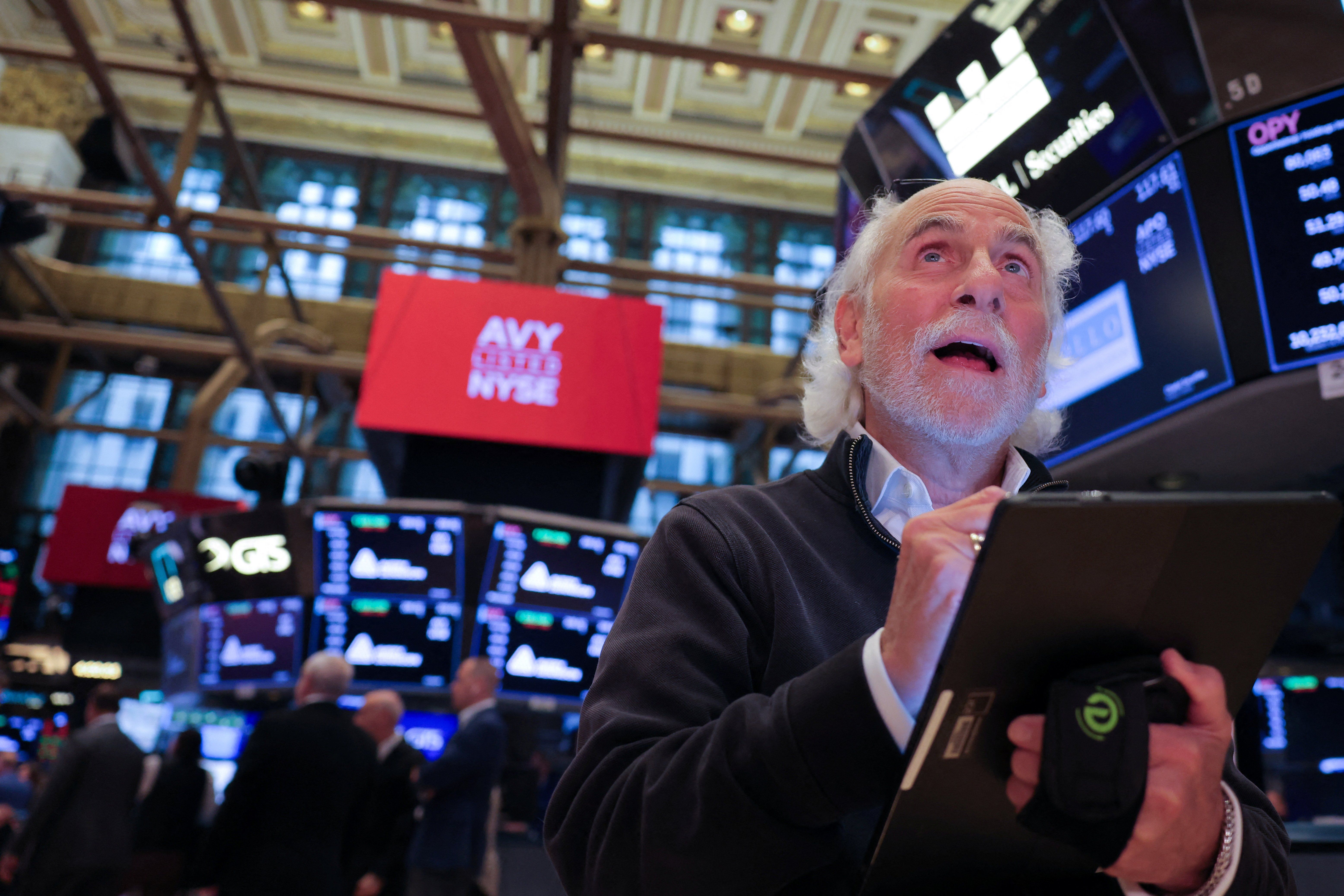 A trader works on the trading floor at The New York Stock Exchange (NYSE) following the Federal Reserve rate announcement, in New York City, U.S., September 18, 2024. 