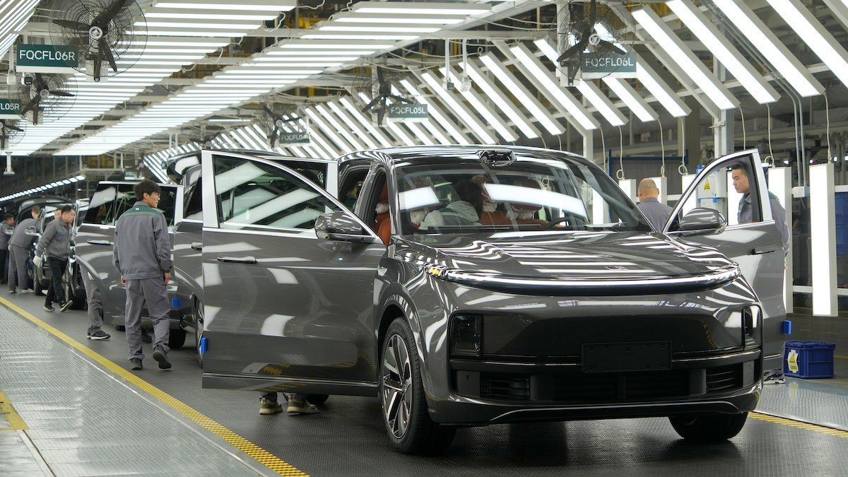 A worker is assembling auto parts on a production line at the Li Auto Manufacturing base in Changzhou, Jiangsu Province, China, on March 27, 2024.