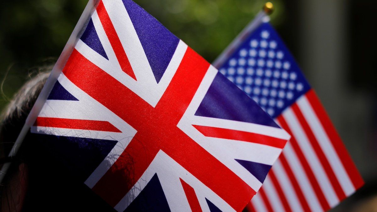 ​British and American flags she takes part in a 'Here's to Meghan!' celebration ahead of her marriage to Prince Harry, as they celebrate at Immaculate Heart High School in Los Angeles, California, U.S., May 15, 2018. 