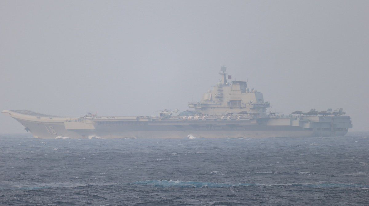 ​Chinese aircraft carrier Liaoning sails through the Miyako Strait near Okinawa on its way to the Pacific in this handout photo taken by Japan Self-Defense Forces and released by the Joint Staff Office of the Defense Ministry of Japan on April 4, 2021. 