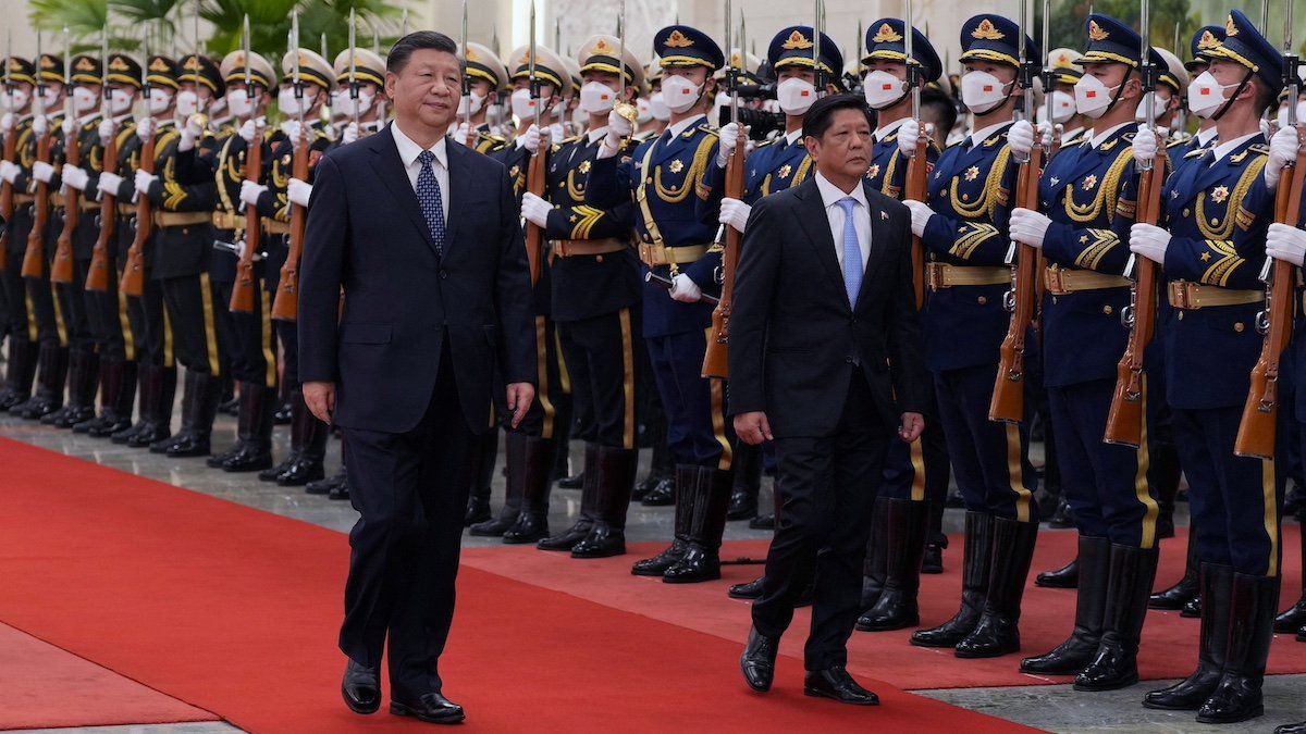 Chinese President Xi Jinping and Philippine President Ferdinand Marcos Jr review the honour guard during a welcome ceremony at the Great Hall of the People in Beijing, China January 4, 2023