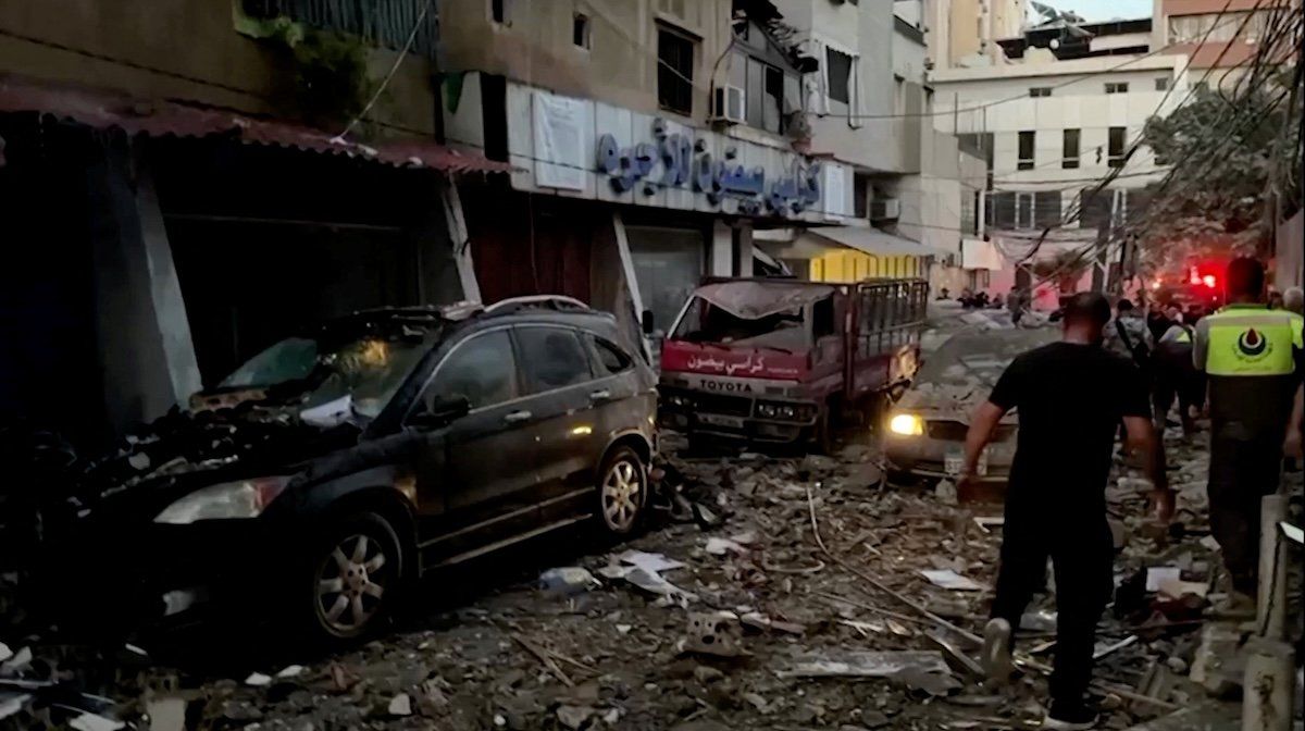 Damaged vehicles are seen after an Israeli strike on Beirut's southern suburbs in Lebanon on July 30, 2024. 