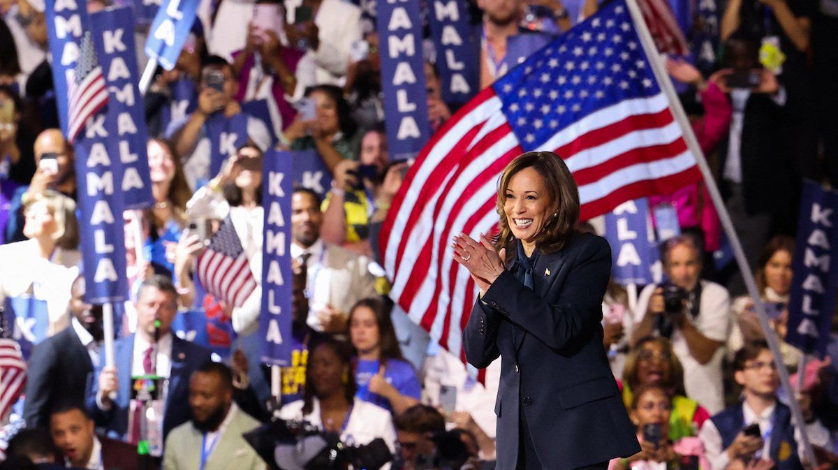 Democratic presidential nominee and U.S. Vice President Kamala Harris applauds from the stage on Day 4 of the Democratic National Convention (DNC) at the United Center in Chicago, Illinois, U.S., August 22, 2024. 